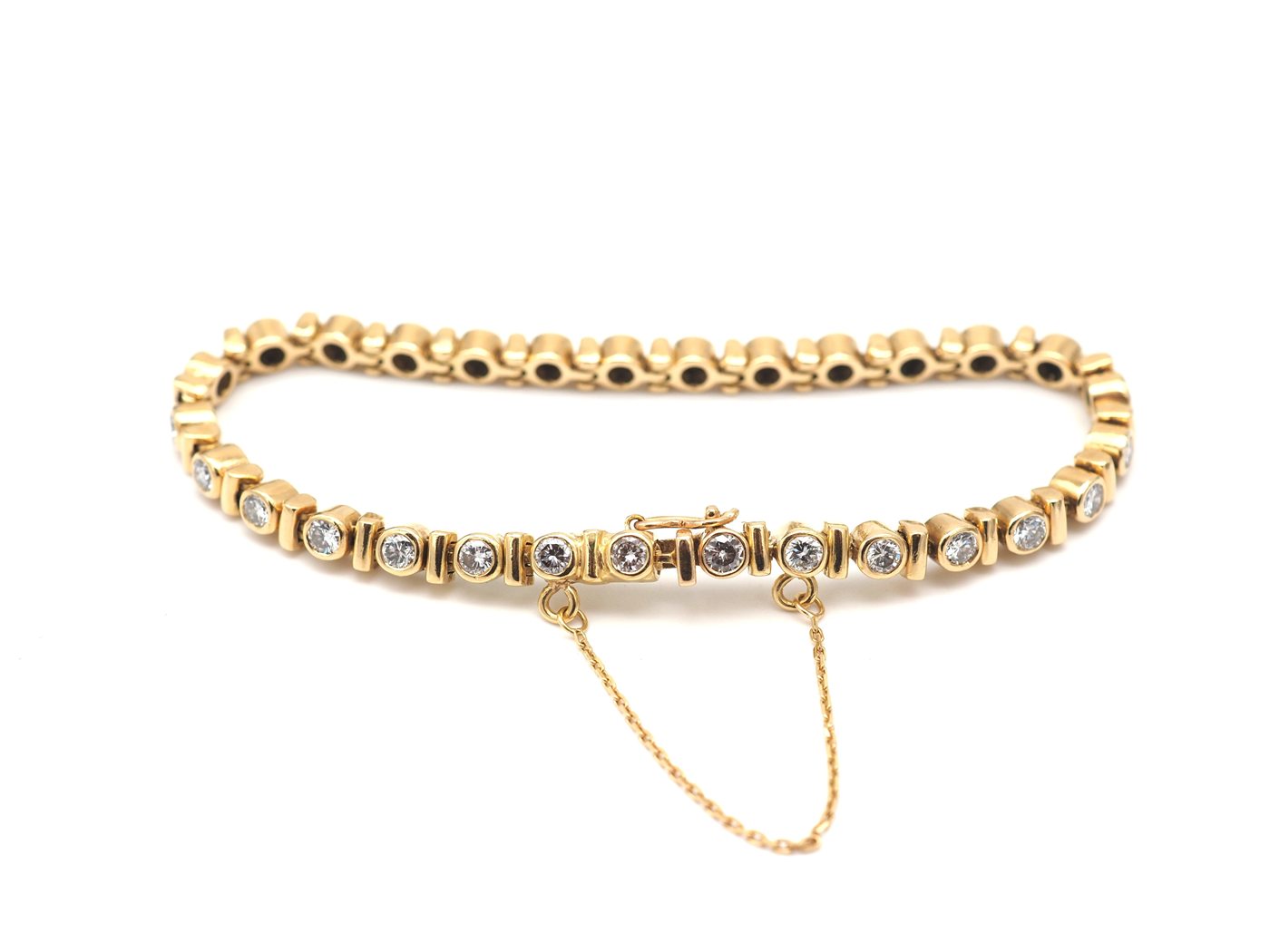 Bracelet rivière en or jaune 750 mil et diamants