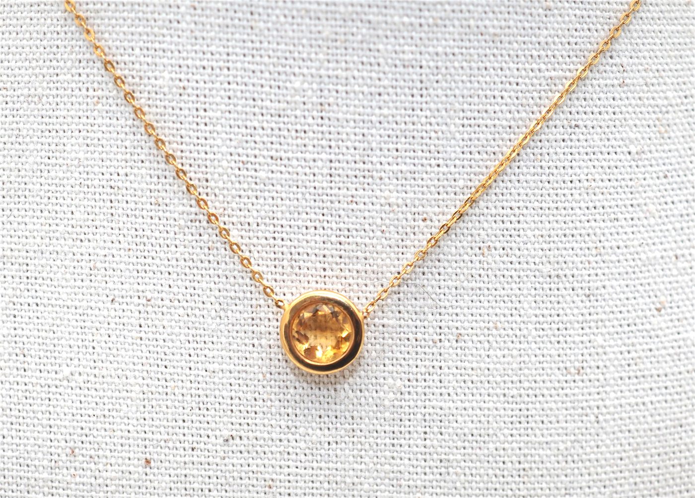 Collier en or jaune 750 mil et citrine