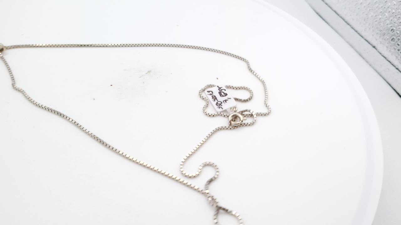 Collier or blanc avec cœur en diamant