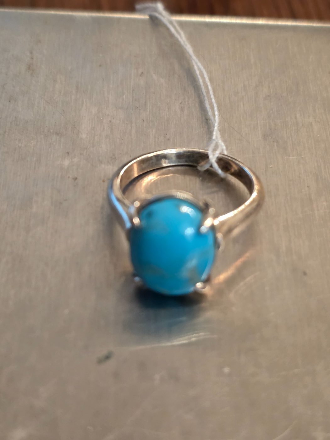 Bague turquoise argent 925 serti griffon ovale